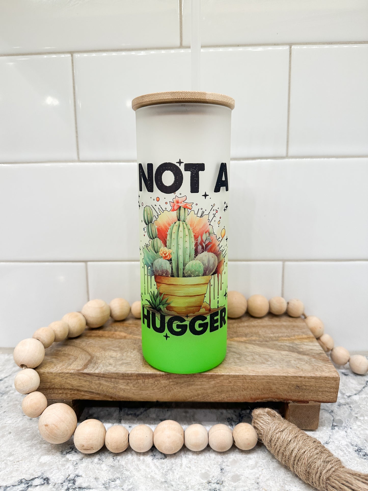 Not A Hugger | 25 oz Glass Tumbler with Bamboo Lid | Frosted Green Glass | Iced Coffee Lover