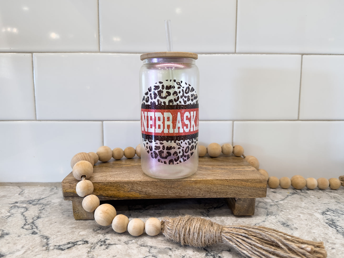 Nebraska Leopard | 16 oz Can Glass with Bamboo Lid | Purple Iridescent | Glass Drinkware