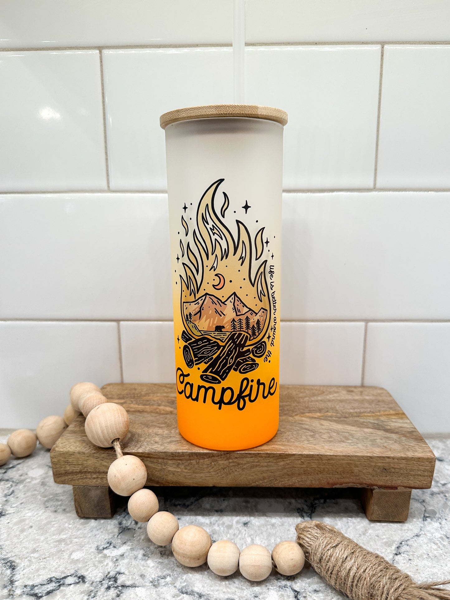 Life is Better Around the Campfire | 25 oz Glass Tumbler with Bamboo Lid | Frosted Orange Glass | Iced Coffee Loverr