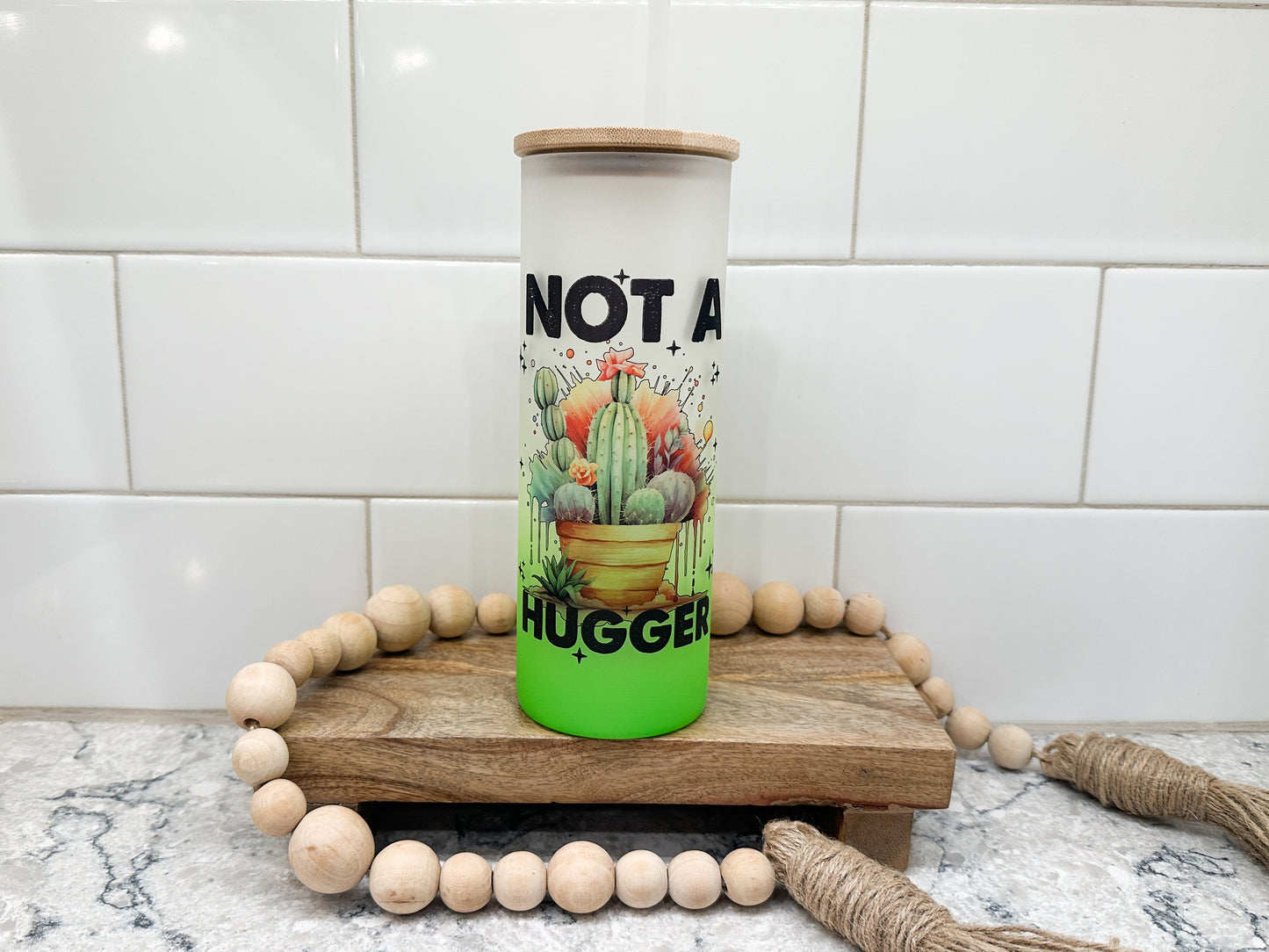 Not A Hugger | 25 oz Glass Tumbler with Bamboo Lid | Frosted Green Glass | Iced Coffee Lover