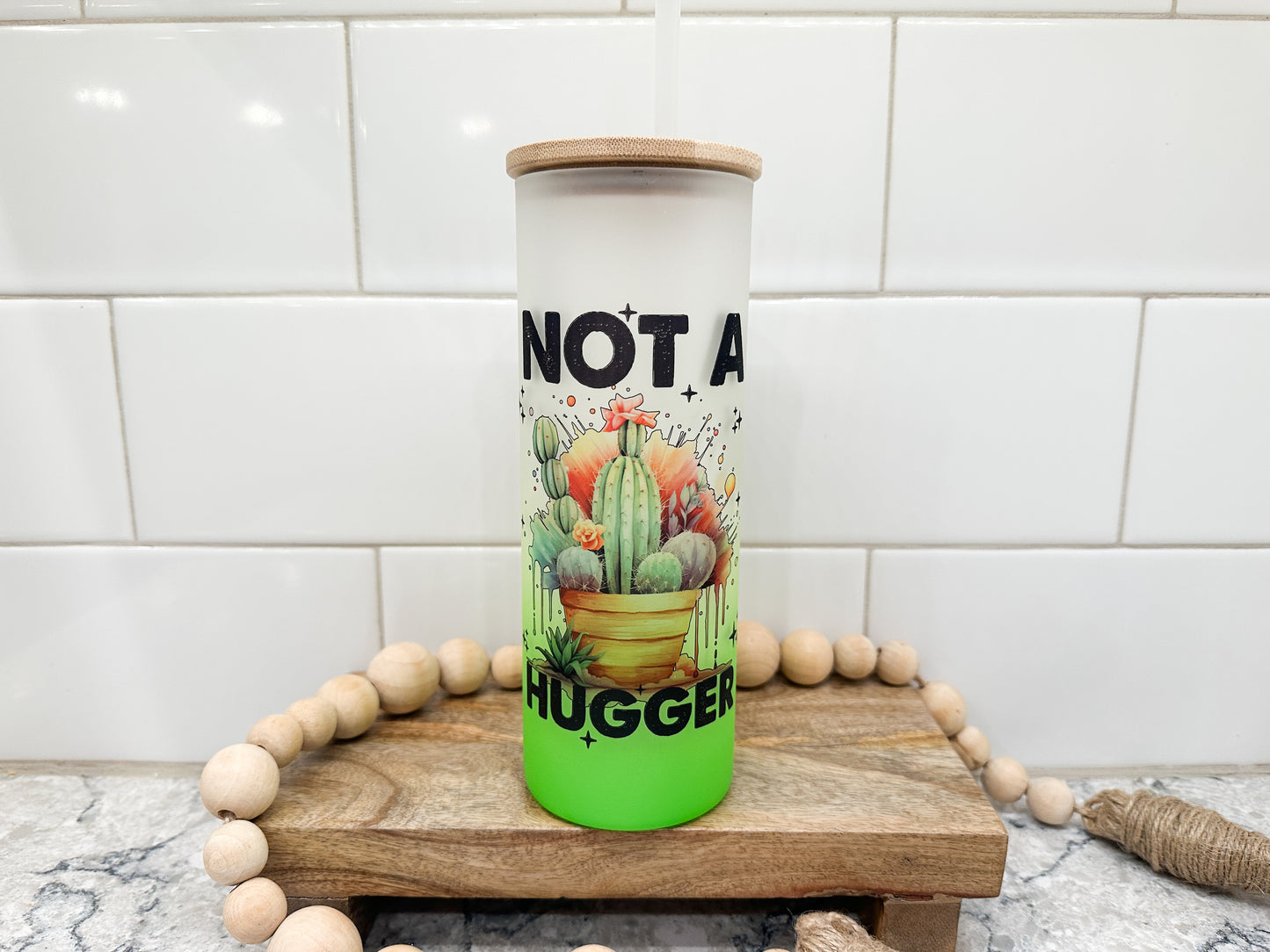 Not A Hugger | 25 oz Glass Tumbler with Bamboo Lid | Frosted Green Glass | Iced Coffee Lover